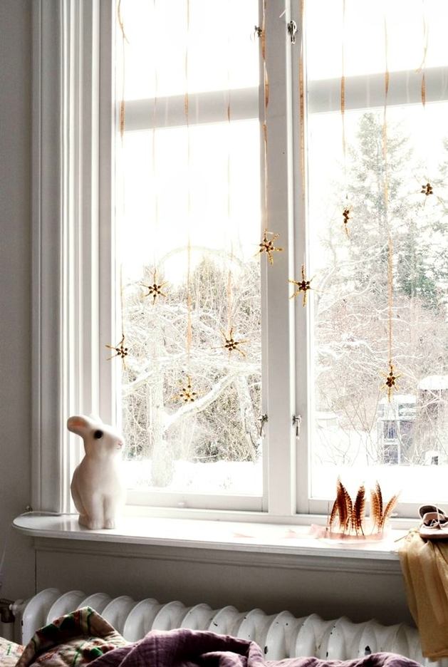 Cum decorezi geamul pentru Revelion: 25 de idei minunate