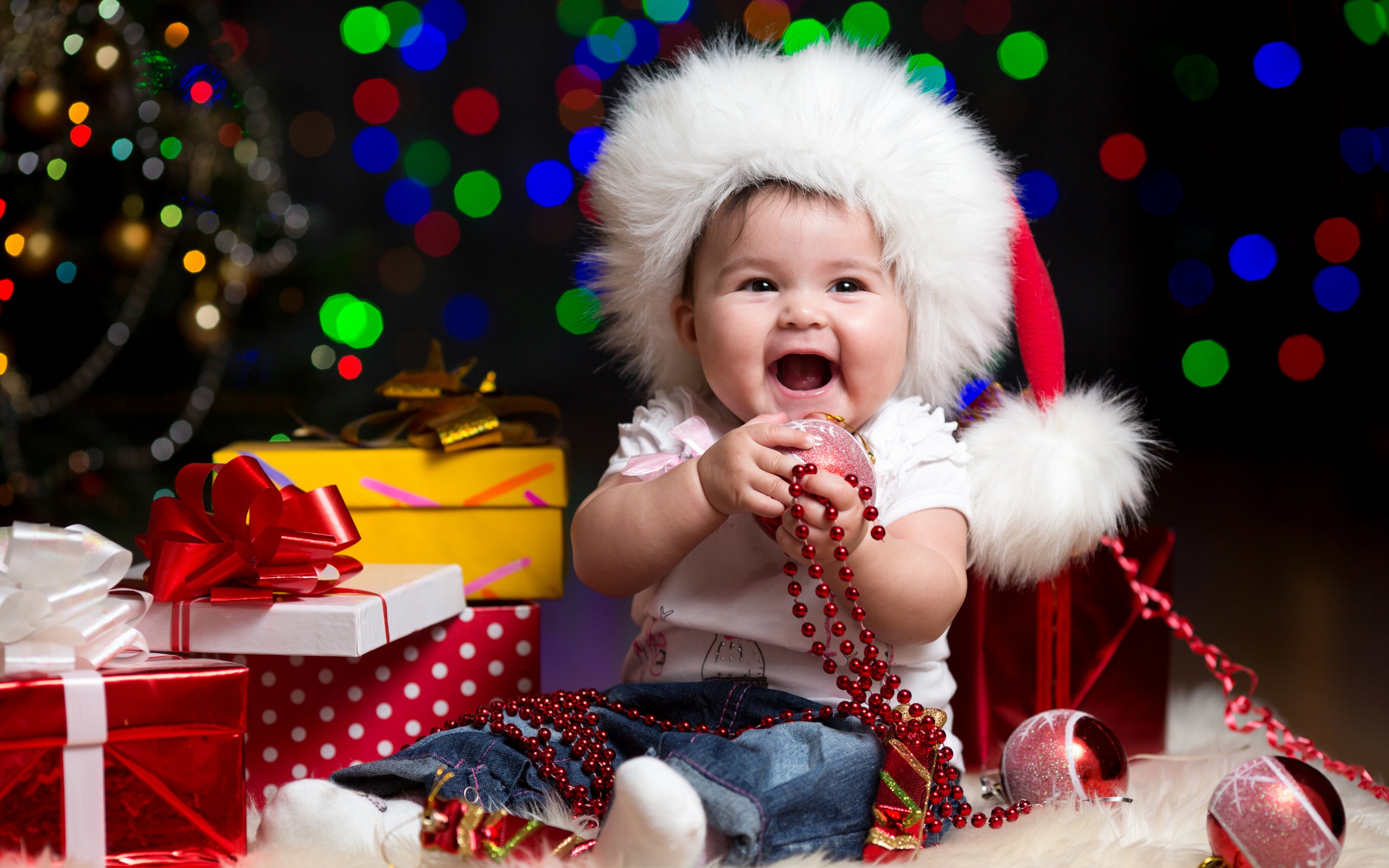 Cadourile de Anul Nou pentru un copil de până la 3 ani: alegem cadoul potrivit în dependență de vârstă