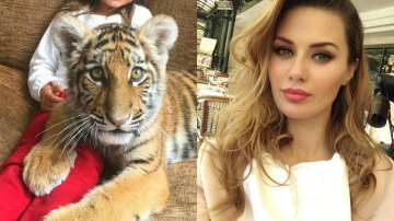 Виктория Боня разрешает дочери играть с диким тигром