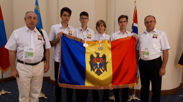 O medalie argint și una de bronz la Olimpiada Internațională la Informatică