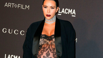 Ким Кардашьян надела «голое» платье на восьмом месяце беременности