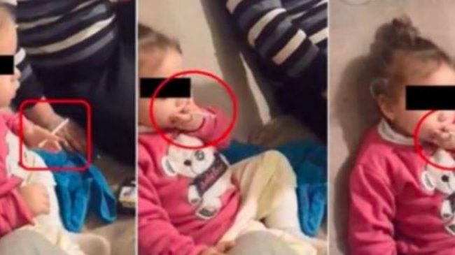 Fetiță de 2 ani, pusă de părinți să fumeze și să bea cafea, apoi filmată – VIDEO