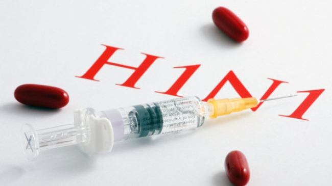 Femeia infectată cu gripă porcină a murit