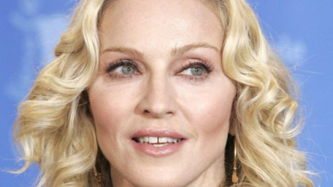 Мадонна собирается усыновить третьего ребенка