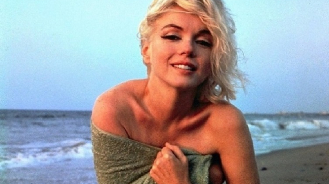 Такой ее увидел мир в последний раз... Уникальные прощальные фотоснимки легендарной Мэрилин Монро