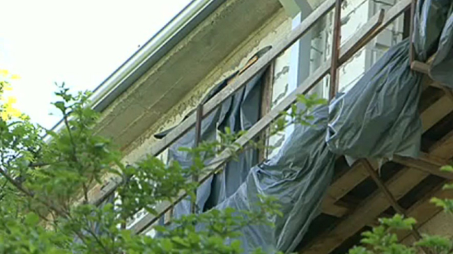 Семьи, чьи мансардные квартиры сгорели на Ботанике год назад, получат новое жилье осенью